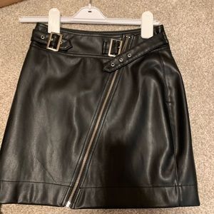 Black leather mini skirt